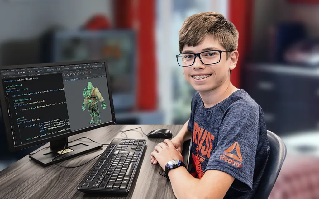 Enfant dans sa chambre participant à un cours de création de jeux vidéo